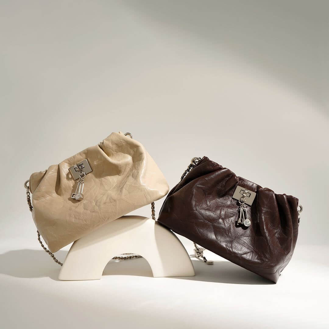 Close-up of blueberry and apricot Folds of elegance crossbody for women