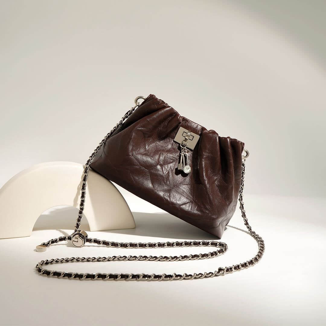 Close-up of blueberry Folds of elegance crossbody for women