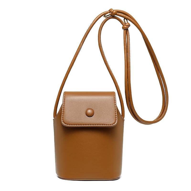 Close-up of brown Luxe small pu leather crossbody bag for women