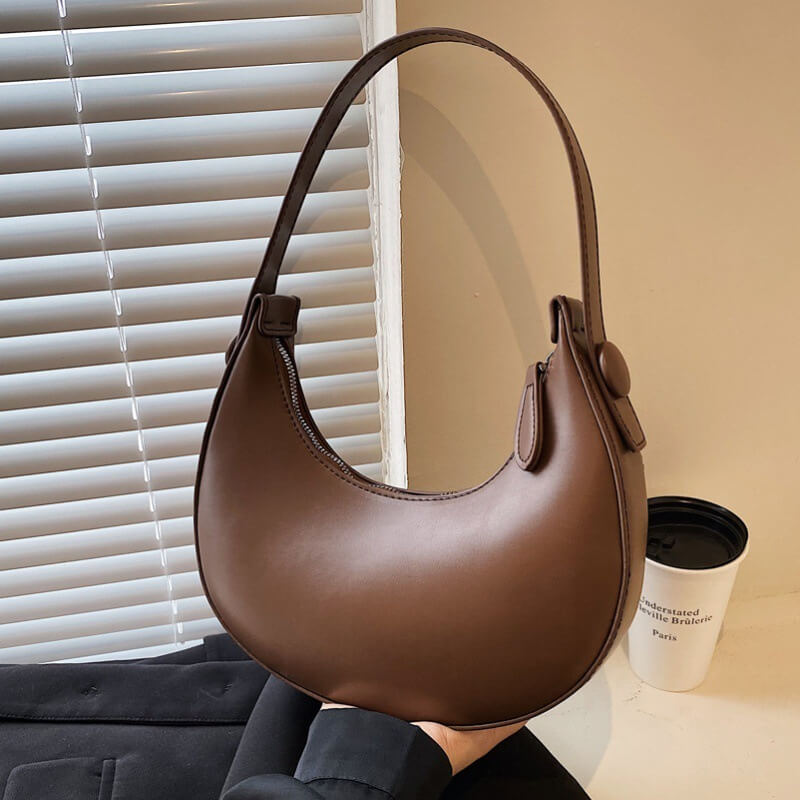 Close-up of retro coffee Vintage dumpling shoulder bag for women