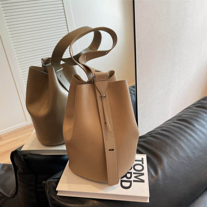 Close-up of windbreaker gray Urbanmood fashion pu leather bucket bag for women
