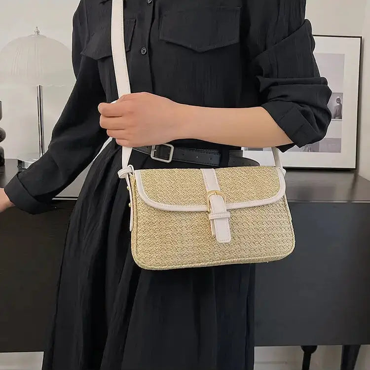 Model carrying beige Summer Vibes straw satchel bag for women