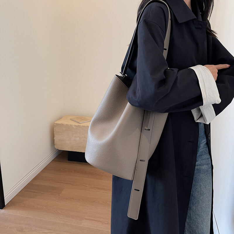 Model carrying elephant gray Urbanmood fashion pu leather bucket bag for women