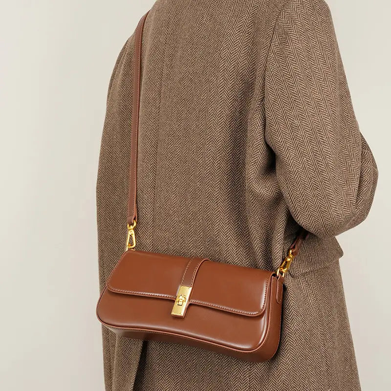 Model crossbody carrying Mocha Luxe shoulder bag for women