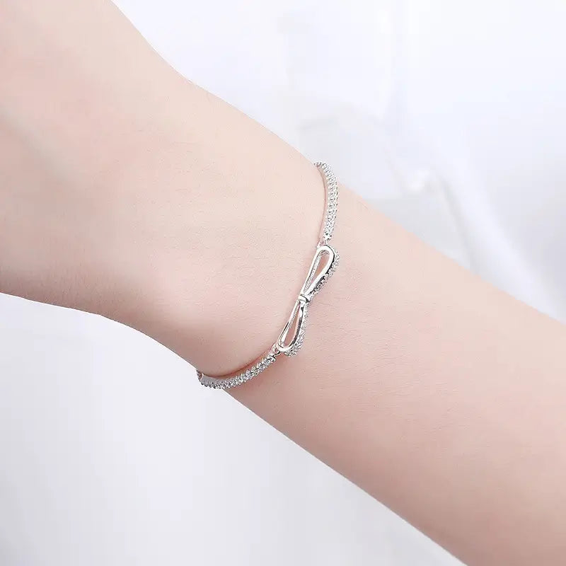 Model wearing Seoul chic bow bracelet for women