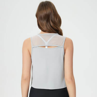 Back view of light gray Millennia active crop tank athletic workout tank top for women
