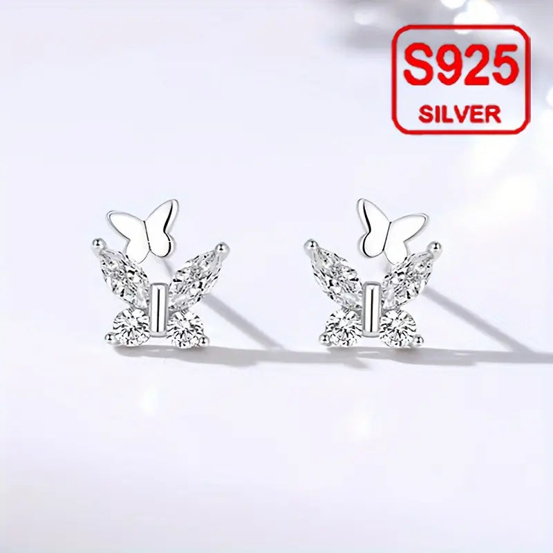 Different angles of silver Twin flutter studs earrings for women